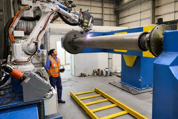 Laser-cladded drilling tools